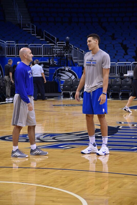 Aaron Gordon and Coach Dave Love warming up before an Orlando Magic game in 2014-15.